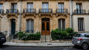 Elegant Stone Facade and Ornate Door in Historic French City